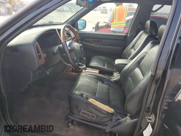 2001 Infiniti QX4 with VIN JNRDR09X21W204207, listed as a Copart auction lot 79935604 with Not Provided miles and Salvage Title. Bid and sale history available at DreamBid. Image 7.