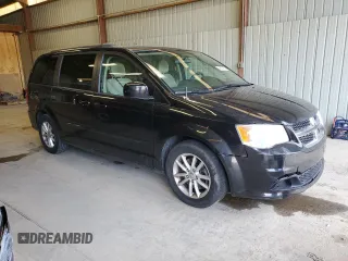 2016 Dodge Grand Caravan SXT with VIN 2C4RDGCGXGR210036, listed as a Copart auction lot 49807385 with 144,805 mi miles and Clean Title. Bid and sale history available at DreamBid. Image 4.