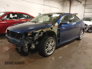 2009 Scion tC with VIN JTKDE167990297921, listed as a IAAI auction lot 41720687 with 159,960 mi miles. Bid and sale history available at carsss.com. Image 19.