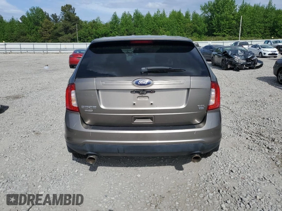 2014 Ford Edge SEL z VIN 2FMDK4JC7EBA47264, wystawiony jako Copart lot #54201255 z przebiegiem 135 408 mil mil oraz Szkoda całkowita • Salvage title. Historia ofert i sprzedaży dostępna na DreamBid. Obrazek 6.