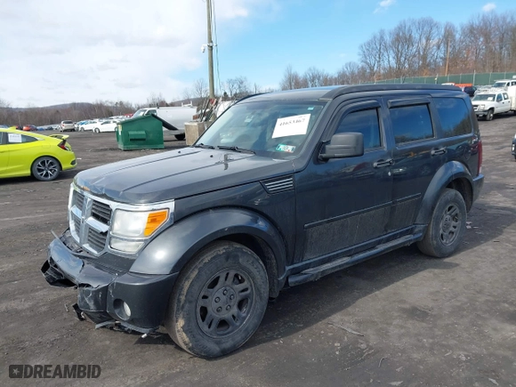 2011 Dodge Nitro SE with VIN 1D4PU2GK0BW541350, listed as a IAAI auction lot 41653467 with 207,940 mi miles. Bid and sale history available at carsss.com. Image 2.
