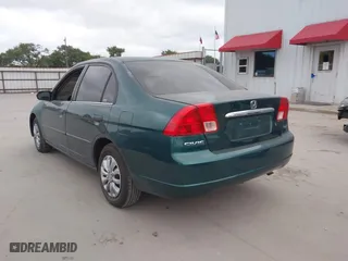 2001 Honda Civic LX with VIN 2HGES16571H570682, listed as a IAAI auction lot 42051409 with 229,962 mi miles. Bid and sale history available at carsss.com. Image 3.