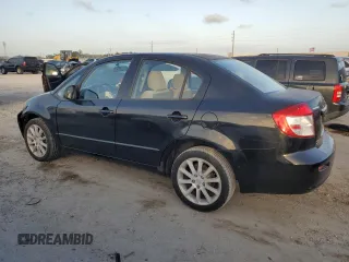 2011 Suzuki SX4 LE with VIN JS2YC5A29B6301704, listed as a Copart auction lot 79430574 with 173,287 mi miles and Salvage Title. Bid and sale history available at carsss.com. Image 2.
