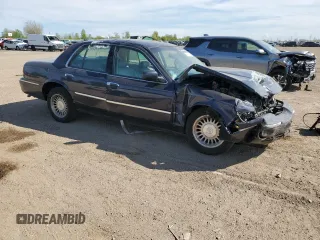 1999 Mercury Grand Marquis LS z VIN 2MEFM75W1XX635839, wystawiony jako Copart lot #55860735 z przebiegiem 114 963 mil mil oraz Szkody całkowita. Historia ofert i sprzedaży dostępna na DreamBid. Obrazek 4.
