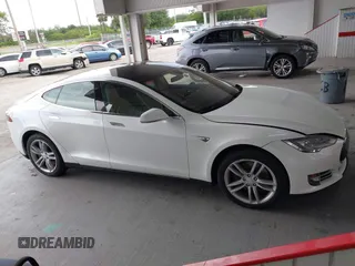 2014 Tesla Model S 60 with VIN 5YJSA1S16EFP53350, listed as a IAAI auction lot 42239753 with 104,985 mi miles and . Bid and sale history available at DreamBid. Image 13.