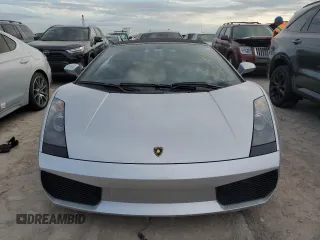 2007 Lamborghini Gallardo z VIN ZHWGU22T57LA05137, wystawiony jako Copart lot #76275354 z przebiegiem Nie podano mil oraz Szkody całkowita. Historia ofert i sprzedaży dostępna na DreamBid. Obrazek 5.