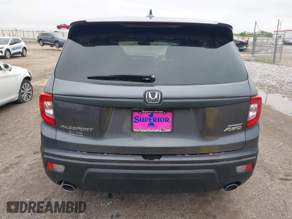 2021 Honda Passport Sport with VIN 5FNYF8H26MB032206, listed as a IAAI auction lot 42282932 with 18,952 mi miles and . Bid and sale history available at DreamBid. Image 16.