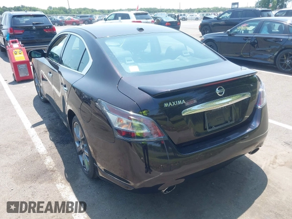 2014 Nissan Maxima SV z VIN 1N4AA5AP7EC486859, wystawiony jako IAAI lot #42420335 z przebiegiem 71 283 mil mil oraz . Historia ofert i sprzedaży dostępna na DreamBid. Obrazek 3.