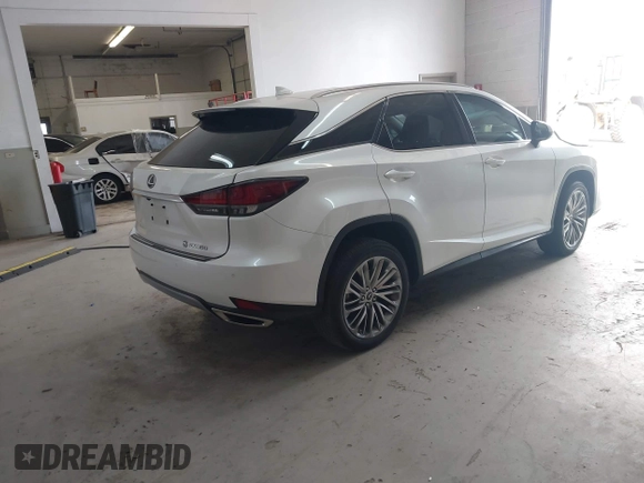 2021 Lexus RX with VIN 2T2JZMDA0MC295323, listed as a IAAI auction lot 42006747 with 45,160 mi miles. Bid and sale history available at carsss.com. Image 4.