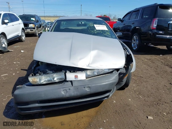 1999 Saturn SL with VIN 1G8ZH5281XZ376254, listed as a IAAI auction lot 41857372 with 229,836 mi miles. Bid and sale history available at carsss.com. Image 6.