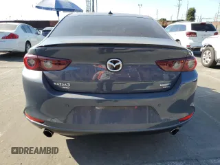 2023 Mazda 3 Premium Plus with VIN 3MZBPBEY5PM374977, listed as a Copart auction lot 70642804 with 9,029 mi miles and Salvage Title. Bid and sale history available at DreamBid. Image 6.