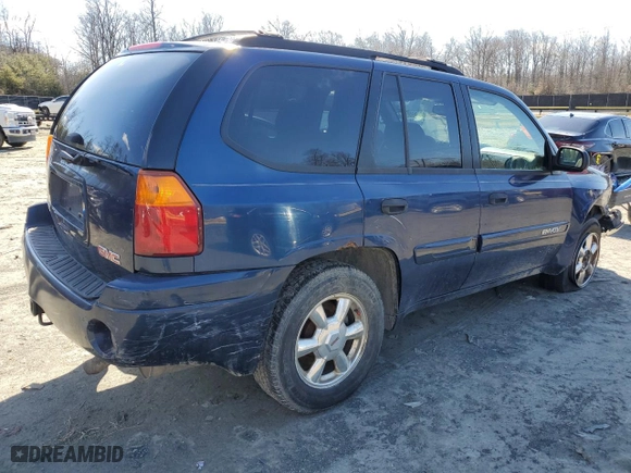 2004 GMC Envoy SLE with VIN 1GKDT13S742411275, listed as a Copart auction lot 45196985 with 205,279 mi miles and Salvage Title. Bid and sale history available at carsss.com. Image 3.