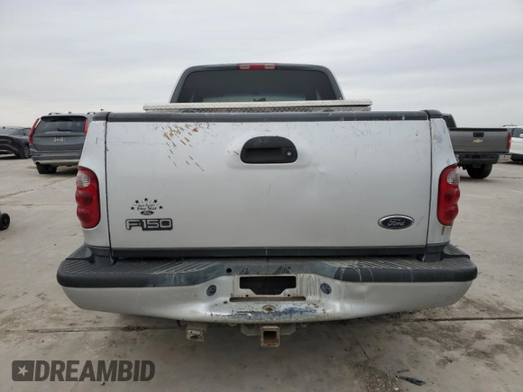 2000 Ford F-150 XL with VIN 1FTRX07L2YKA09673, listed as a Copart auction lot 48177615 with Not provided miles and Salvage title. Bid and sale history available at DreamBid. Image 6.