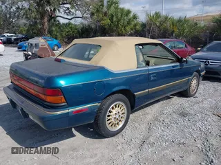 1995 Chrysler LeBaron z VIN 1C3EU4531SF679446, wystawiony jako IAAI lot #41441543 z przebiegiem 105 525 mil mil oraz . Historia ofert i sprzedaży dostępna na DreamBid. Obrazek 4.