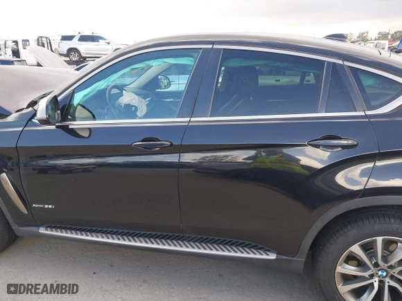 2016 BMW X6 xDrive35i with VIN 5UXKU2C50G0N83968, listed as a IAAI auction lot 41958971 with 70,738 mi miles. Bid and sale history available at carsss.com. Image 14.