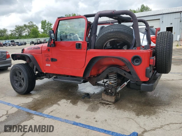 2000 Jeep Wrangler SE with VIN 1J4FA29P6YP793045, listed as a Copart auction lot 58756715 with 202,110 mi miles and Salvage title. Bid and sale history available at DreamBid. Image 2.