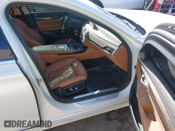 2020 BMW 7 Series 740i with VIN WBA7T2C0XLGL17774, listed as a IAAI auction lot 42278067 with 100,465 mi miles and . Bid and sale history available at DreamBid. Image 5.