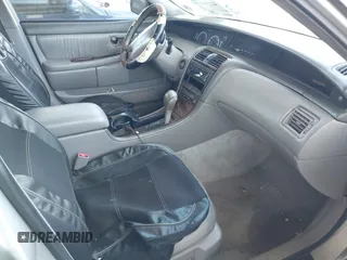2001 Toyota Avalon XL z VIN 4T1BF28B71U120831, wystawiony jako IAAI lot #42299159 z przebiegiem 220 936 mil mil oraz . Historia ofert i sprzedaży dostępna na DreamBid. Obrazek 5.