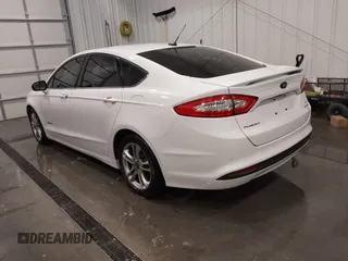 2015 Ford Fusion SE Hybrid with VIN 3FA6P0LU8FR215788, listed as a IAAI auction lot 42038194 with 136,949 mi miles and . Bid and sale history available at DreamBid. Image 3.