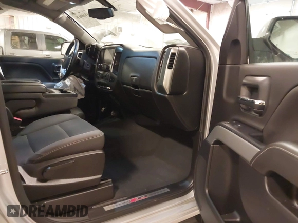 2019 Chevrolet Silverado 1500 LT with VIN 2GCVKPEC1K1212411, listed as a IAAI auction lot 41060633 with 75,508 mi miles and . Bid and sale history available at DreamBid. Image 5.