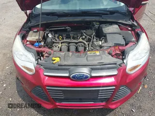 2013 Ford Focus SE z VIN 1FADP3F29DL149377, wystawiony jako IAAI lot #42472584 z przebiegiem 79 402 mil mil oraz . Historia ofert i sprzedaży dostępna na DreamBid. Obrazek 10.