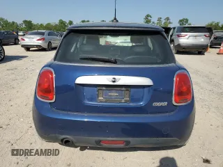 2014 MINI Hardtop with VIN WMWXM5C59ET972044, listed as a Copart auction lot 52519775 with 91,490 mi miles and Clean Title. Bid and sale history available at DreamBid. Image 6.