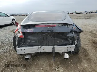 2015 Nissan 370Z with VIN JN1AZ4EH8FM444456, listed as a Copart auction lot 76279024 with 58,513 mi miles and Salvage Title. Bid and sale history available at carsss.com. Image 6.