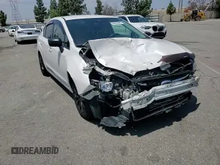 2015 Subaru Impreza with VIN JF1GJAA69FH002687, listed as a Copart auction lot 60653395 with 106,054 mi miles and Salvage title. Bid and sale history available at DreamBid. Image 13.