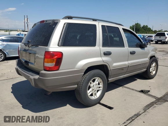 2003 Jeep Grand Cherokee Laredo with VIN 1J4GW48S23C524693, listed as a Copart auction lot 64461755 with 243,936 mi miles and Salvage title. Bid and sale history available at DreamBid. Image 3.