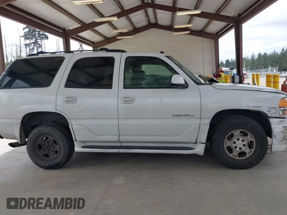 2004 GMC Yukon Denali z VIN 1GKEK63U84J148225, wystawiony jako IAAI lot #42218451 z przebiegiem 296 149 mil mil oraz . Historia ofert i sprzedaży dostępna na DreamBid. Obrazek 13.