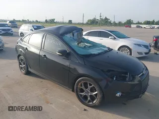 2013 Ford Focus SE with VIN 1FADP3F20DL361861, listed as a IAAI auction lot 42652227 with 104,502 mi miles and . Bid and sale history available at DreamBid. Image 1.