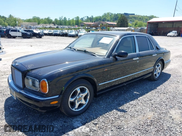 1999 Bentley Arnage z VIN SCBLB51E1XCX01401, wystawiony jako IAAI lot #42133144 z przebiegiem 29 699 mil mil oraz . Historia ofert i sprzedaży dostępna na DreamBid. Obrazek 2.