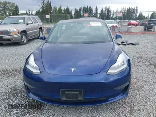 2018 Tesla Model 3 Long Range Battery z VIN 5YJ3E1EBXJF092025, wystawiony jako IAAI lot #42268369 z przebiegiem 132 687 mil mil oraz . Historia ofert i sprzedaży dostępna na DreamBid. Obrazek 13.