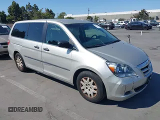 2006 Honda Odyssey LX with VIN 5FNRL38226B085181, listed as a IAAI auction lot 42594621 with 210,616 mi miles and . Bid and sale history available at DreamBid. Image 1.