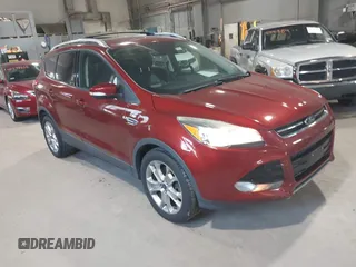 2016 Ford Escape Titanium with VIN 1FMCU9JXXGUA00927, listed as a IAAI auction lot 42577740 with 133,816 mi miles and . Bid and sale history available at DreamBid. Image 1.