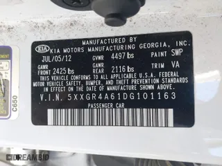 2013 Kia Optima SX w/Limited Pkg with VIN 5XXGR4A61DG101163, listed as a IAAI auction lot 41706540 with 146,225 mi miles. Bid and sale history available at carsss.com. Image 9.