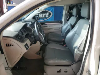2011 Volkswagen Routan SE with VIN 2V4RW3DG7BR717718, listed as a Copart auction lot 63480915 with 271,938 mi miles and Salvage title. Bid and sale history available at DreamBid. Image 7.