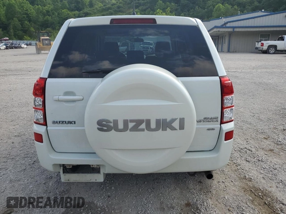 2010 Suzuki Grand Vitara Premium z VIN JS3TD0D24A4100983, wystawiony jako Copart lot #60311295 z przebiegiem 104 455 mil mil oraz Szkoda całkowita • Salvage title. Historia ofert i sprzedaży dostępna na DreamBid. Obrazek 6.