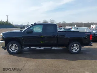 2017 Chevrolet Silverado 1500 LT with VIN 1GCVKREC3HZ126576, listed as a IAAI auction lot 41477637 with 124,670 mi miles. Bid and sale history available at carsss.com. Image 14.
