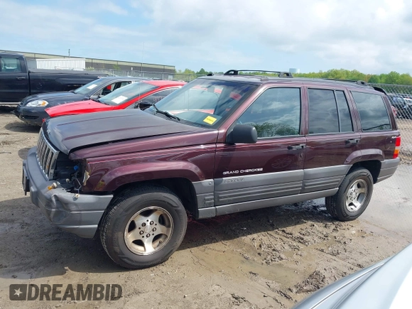 1997 Jeep Grand Cherokee Laredo with VIN 1J4GZ58S4VC702040, listed as a IAAI auction lot 42165536 with 121,803 mi miles and . Bid and sale history available at DreamBid. Image 15.