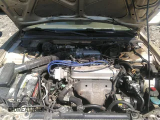 1994 Honda Accord LX with VIN 1HGCD5636RA020200, listed as a IAAI auction lot 40056997 with 212,810 mi miles. Bid and sale history available at carsss.com. Image 10.