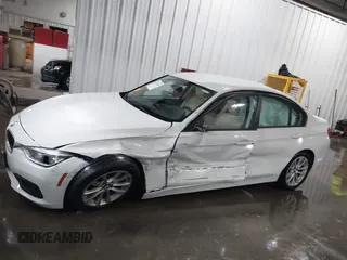 2018 BMW 3 Series 320i xDrive with VIN WBA8E5G56JNU47338, listed as a IAAI auction lot 41238204 with 54,596 mi miles. Bid and sale history available at carsss.com. Image 6.