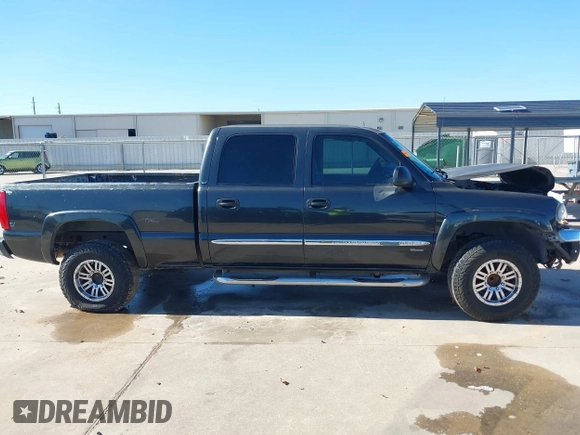 2003 GMC Sierra 1500HD SLE z VIN 1GTGC13U53F203980, wystawiony jako IAAI lot #41206524 z przebiegiem 309 414 mil mil oraz . Historia ofert i sprzedaży dostępna na DreamBid. Obrazek 14.