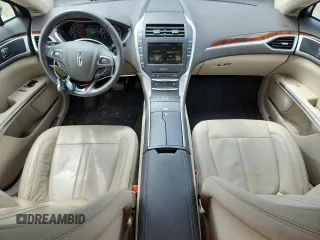 2016 Lincoln MKZ z VIN 3LN6L2G94GR613505, wystawiony jako Copart lot #60842925 z przebiegiem 55 154 mil mil oraz Szkoda całkowita • Salvage title. Historia ofert i sprzedaży dostępna na DreamBid. Obrazek 8.