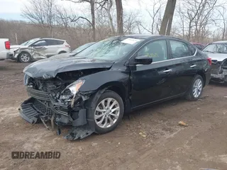 2019 Nissan Sentra SV z VIN 3N1AB7AP9KY389431, wystawiony jako IAAI lot #41652025 z przebiegiem 81 241 mil mil oraz . Historia ofert i sprzedaży dostępna na DreamBid. Obrazek 18.