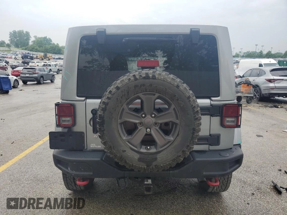 2018 Jeep Wrangler Unlimited Rubicon Recon with VIN 1C4BJWFGXJL814198, listed as a Copart auction lot 59434645 with 43,931 mi miles and Salvage title. Bid and sale history available at DreamBid. Image 6.