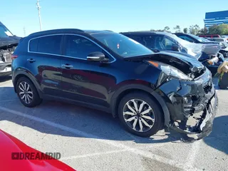 2018 Kia Sportage EX with VIN KNDPN3AC6J7387429, listed as a IAAI auction lot 41833920 with 105,307 mi miles and . Bid and sale history available at DreamBid. Image 13.