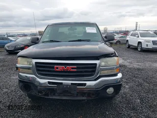 2004 GMC Sierra 1500 SLT with VIN 1GTEK19T74E400259, listed as a IAAI auction lot 41091044 with 173,726 mi miles. Bid and sale history available at carsss.com. Image 12.