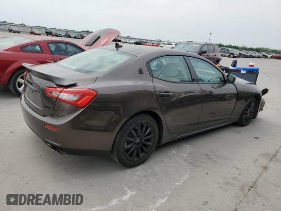 2014 Maserati Ghibli S Q4 with VIN ZAM57RTA6E1085708, listed as a Copart auction lot 53710095 with 110,799 mi miles and Salvage title. Bid and sale history available at DreamBid. Image 3.