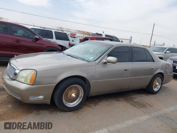 2003 Cadillac DeVille z VIN 1G6KD54Y63U223640, wystawiony jako IAAI lot #41704549 z przebiegiem 127 981 mil mil oraz . Historia ofert i sprzedaży dostępna na DreamBid. Obrazek 14.